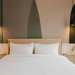 Suite met een Queen Size Bed